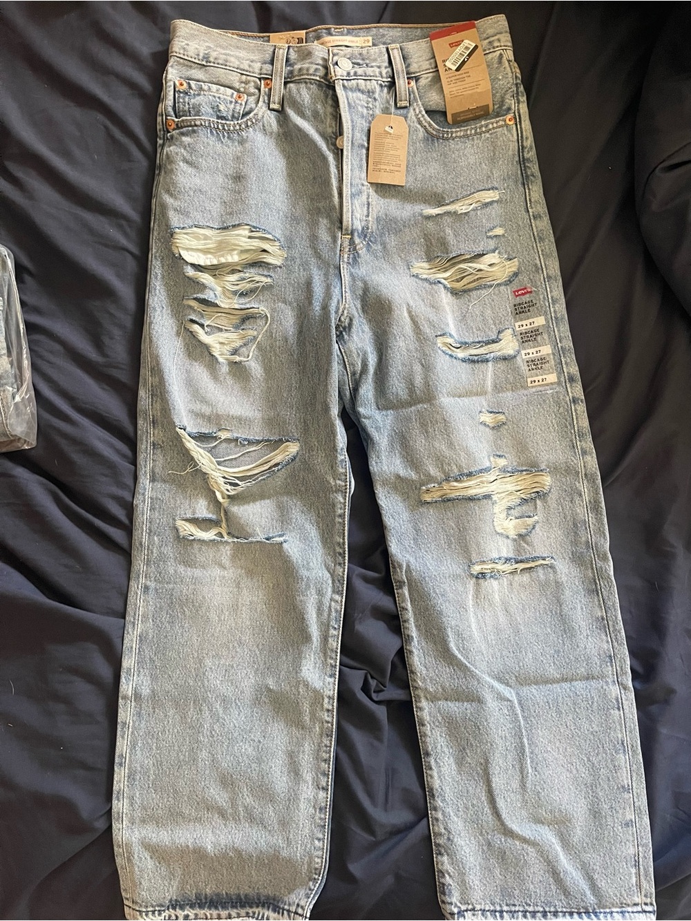 Levi's light blue distressed straight-leg jeans